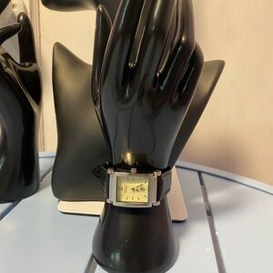 Embassy by Gruen Quartz Gold Tone Rectangular Watch Black Leather Band